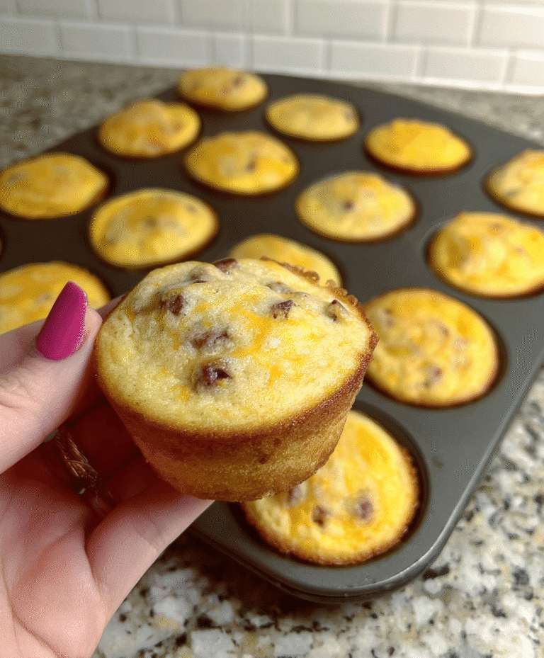 Mini breakfast bites with sausage and cheese on granite countertop