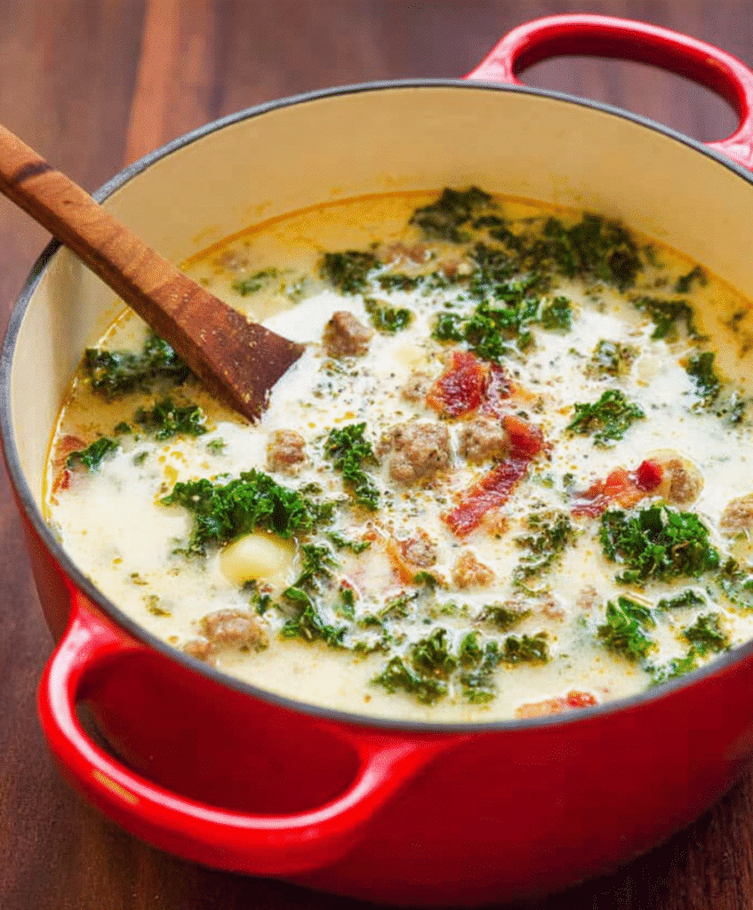 Homemade Zuppa Toscana with kale, Italian sausage, and crispy bacon in a creamy broth.