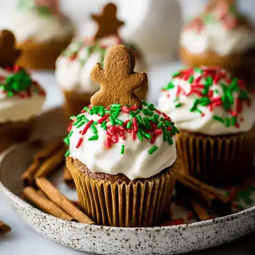 Festive Christmas Chai Cupcakes with Cream Cheese frosting and gingerbread men.