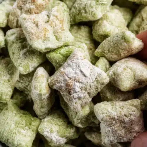 Delicious Pistachio Puppy Chow snack mix with chocolate and green pistachios